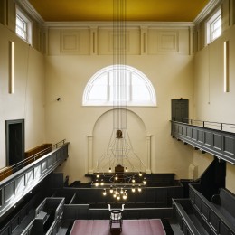 Overhead view of court room showing benches and chandelier