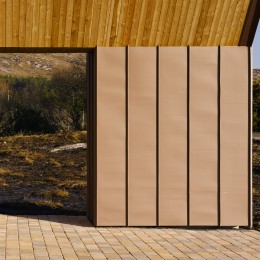 Exerior view of patio showing copper cladding and bogside