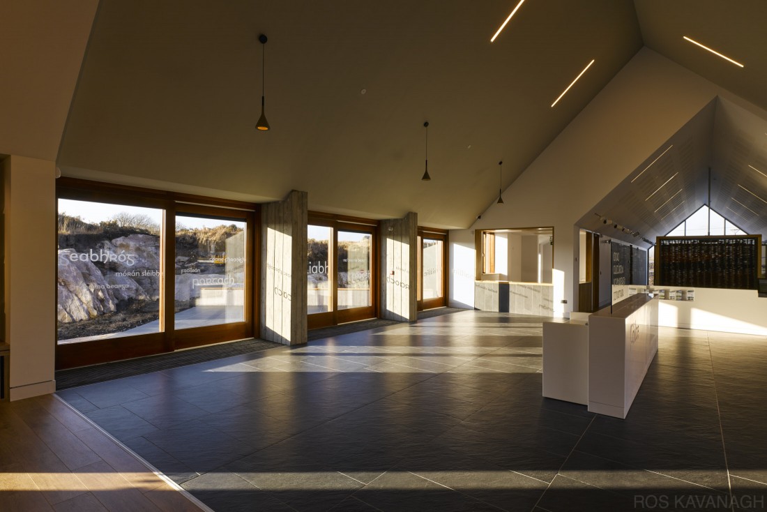Interior view of reception area showing slate floors and glass walls